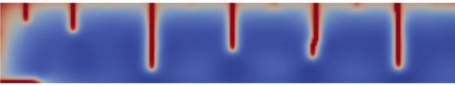 Diagram showing regularly spaced cracks induced by desiccation in a clay specimen drying from the upper surface.